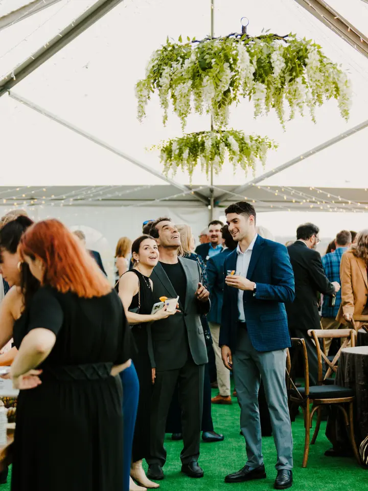 Clear top tent with floral chandelier for wedding reception Dover, Delaware
