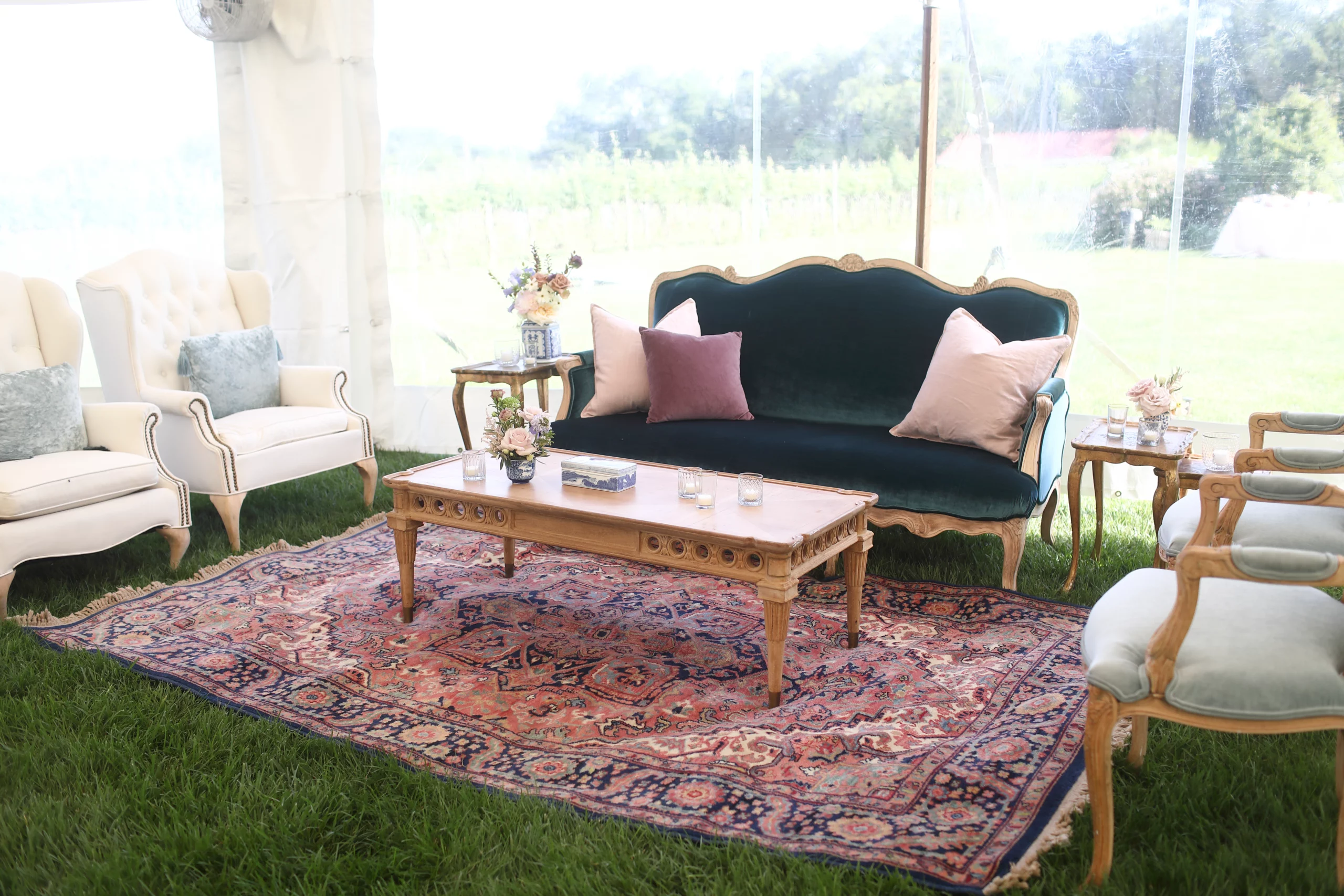 lounge seating under wedding tent