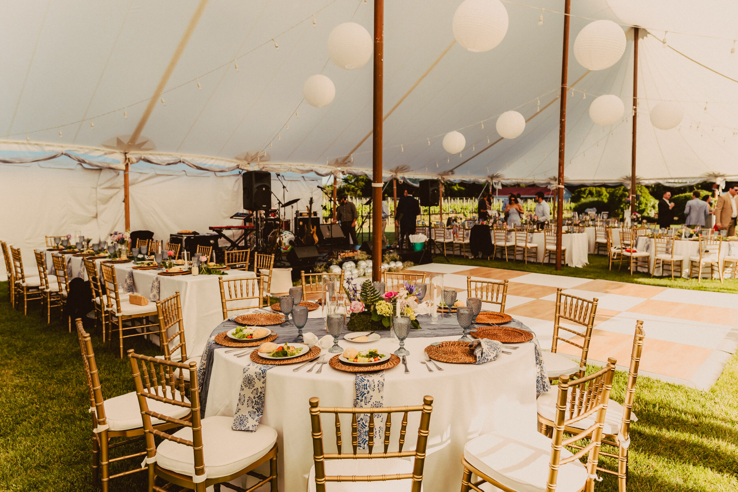 dusty blue and white wedding under clear top tent at Winterthur Museum