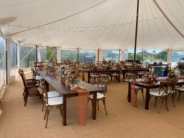 sailcloth tent with tan astro turf flooring