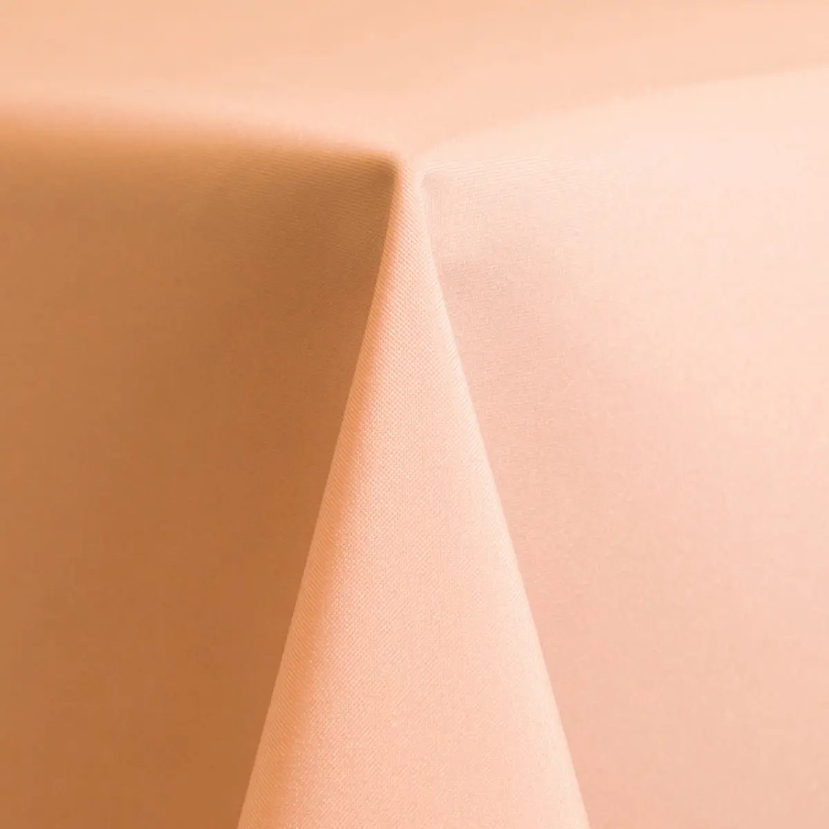 peach poly linen rental by Collective Event Group up close