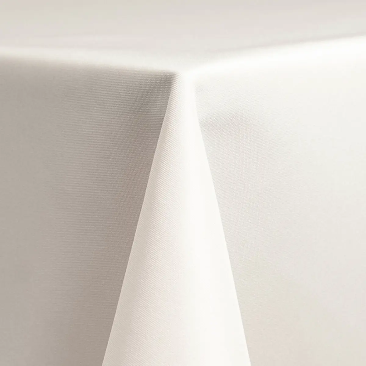 White polyester linen rental from Collective Event Group up close
