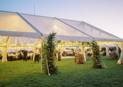 clear top wedding tent rental with twinkle lighting