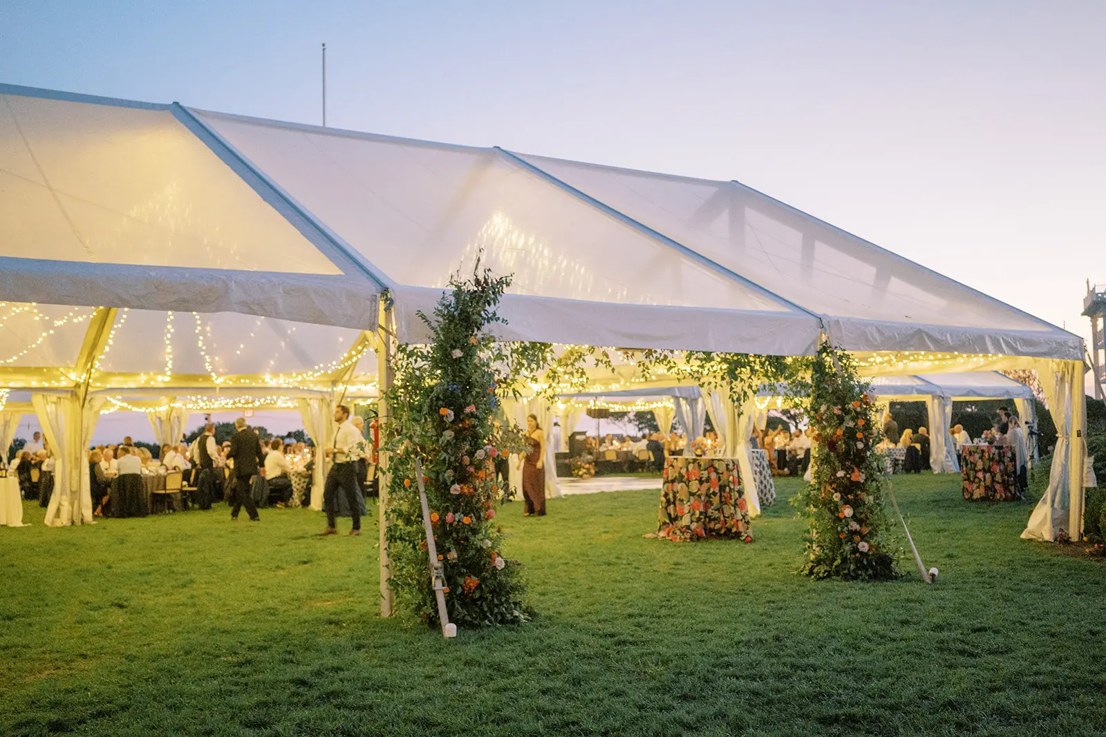 clear top wedding tent rental with twinkle lighting