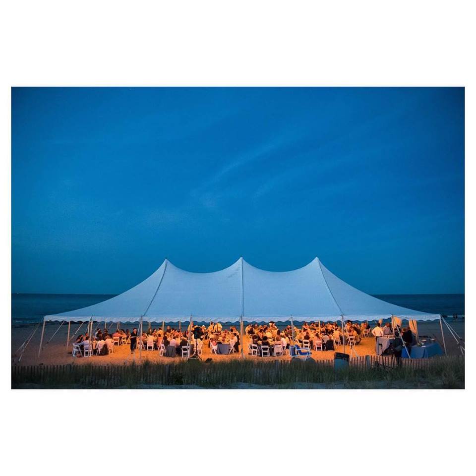 habc tent on beach white wedding tent with lighting on beach at dusk in rehoboth beach