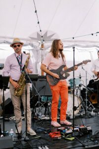wedding band playing on stage for reception