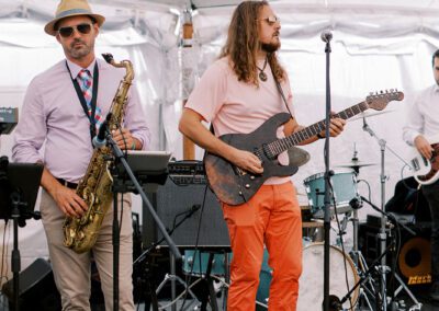 wedding band playing on stage for reception