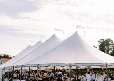 Sailcloth Tent against an open sky at Isaac Smith Vineyard in Cape May, NJ. Install by Collective Event Group