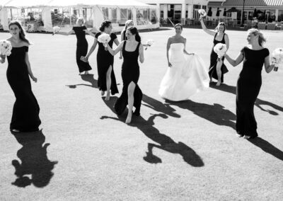 bride walking with bridesmaids