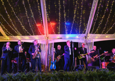 Band and uplighting at the Westside Healthcare Gala held at Winterthur Museum. Tent and rentals by Collective Event Group