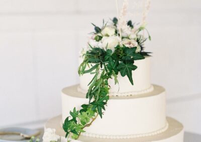 wedding cake white with greenery
