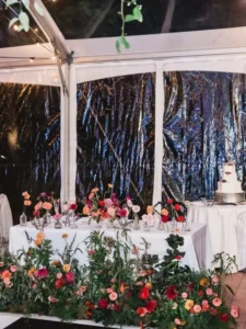 sweetheart table against a clear sidewall under a cleartop tent at winterthur