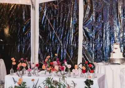 sweetheart table against a clear sidewall under a cleartop tent at winterthur