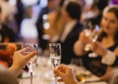 two champagne glasses clinking