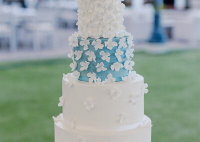 white and blue floral wedding cake