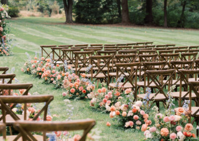 cross-back chairs set up in rows for outdoor wedding ceremony