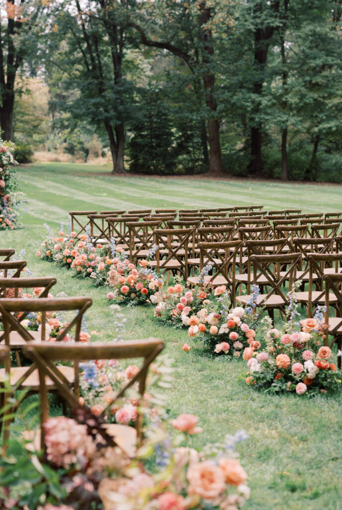 cross-back chairs set up in rows for outdoor wedding ceremony