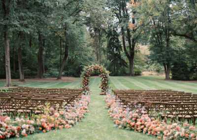 cross-back chairs set up in rows for outdoor wedding ceremony
