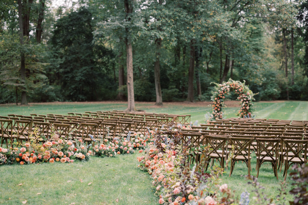 cross-back chairs set up in rows for outdoor wedding ceremony