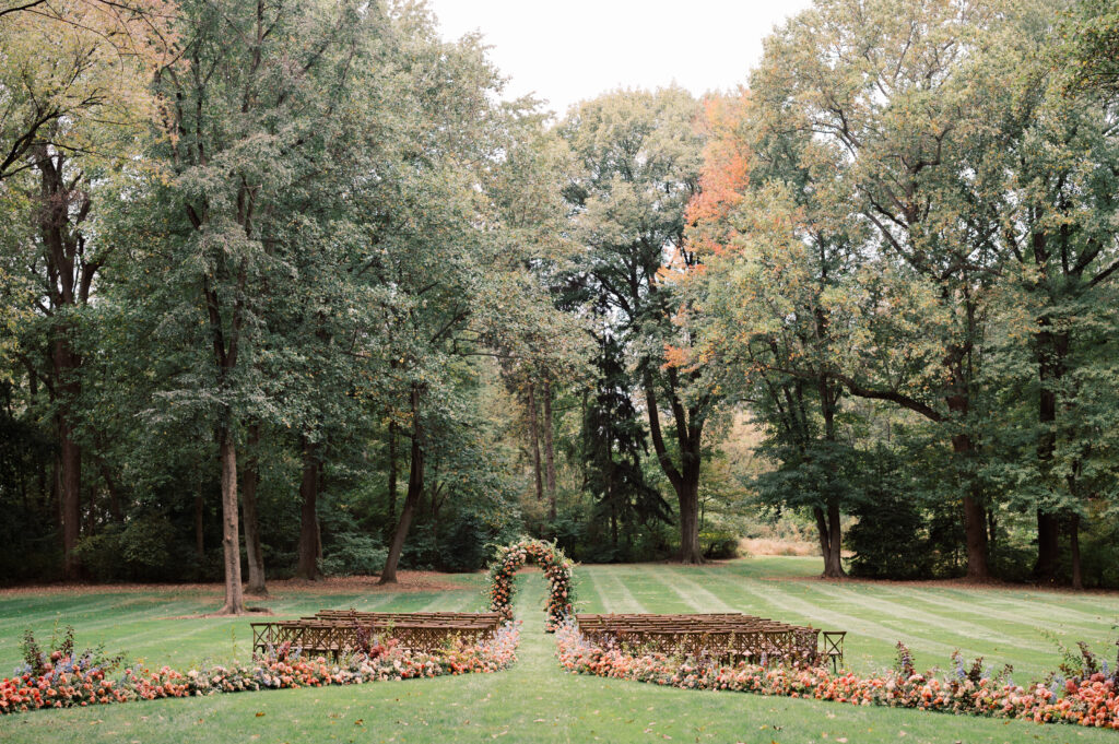 cross-back chairs set up in rows for outdoor wedding ceremony