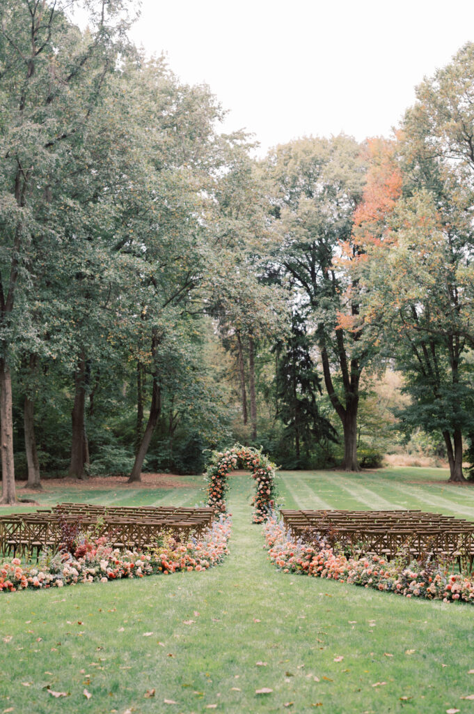 cross-back chairs set up in rows for outdoor wedding ceremony
