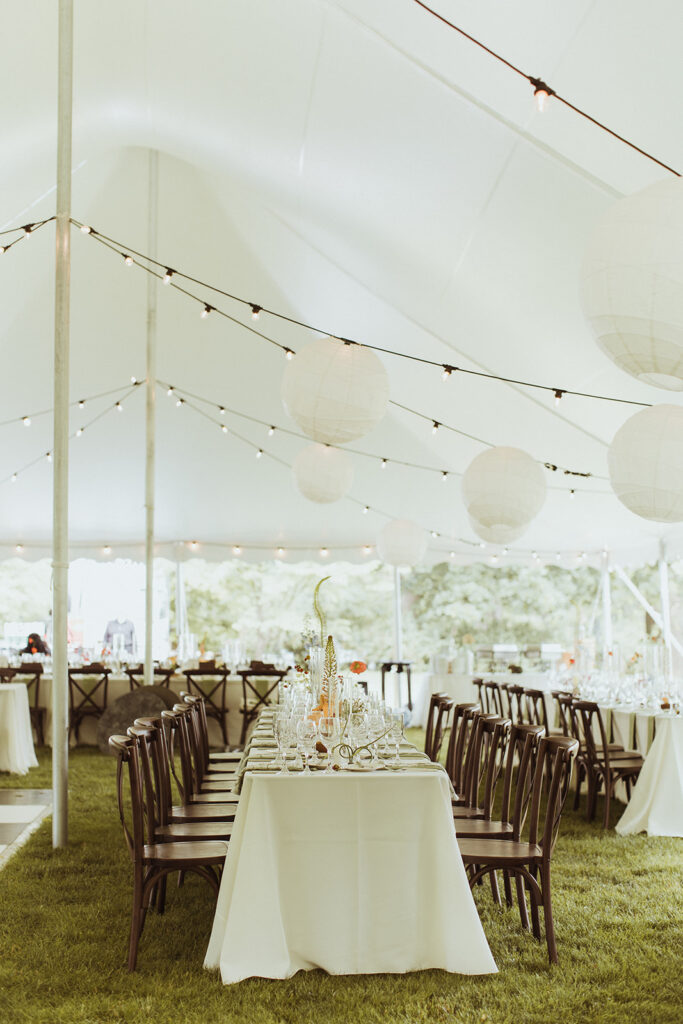 wedding tent with market lighting and paper lanterns