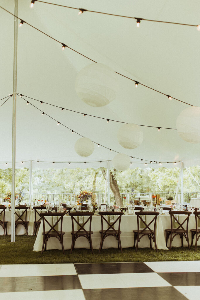 wedding tent with market lighting and paper lanterns