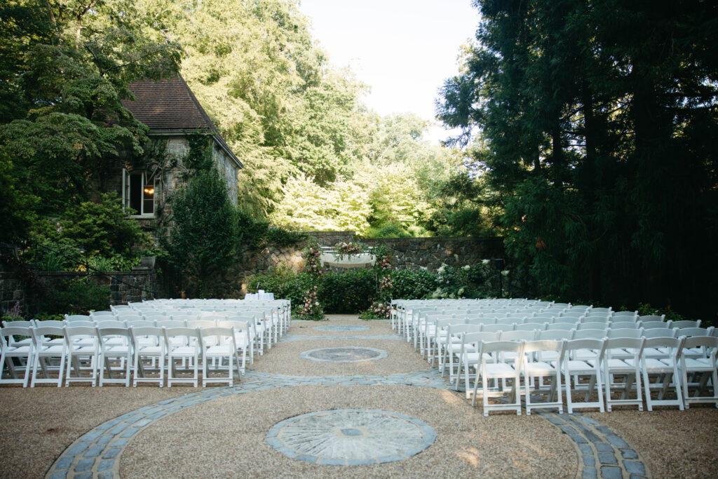 white chairs set up for wedding ceremony