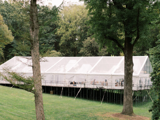 Clear Top Tent Wedding with Elevated Flooring on a Hillside