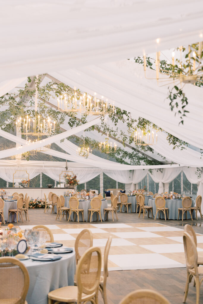 clear top wedding tent with ceiling draping, birch/white check dance floor