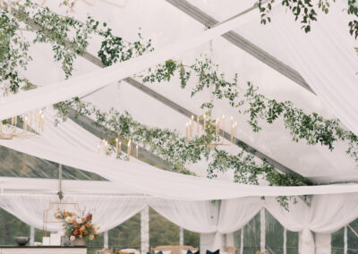 clear top wedding tent with ceiling draping, birch/white check dance floor
