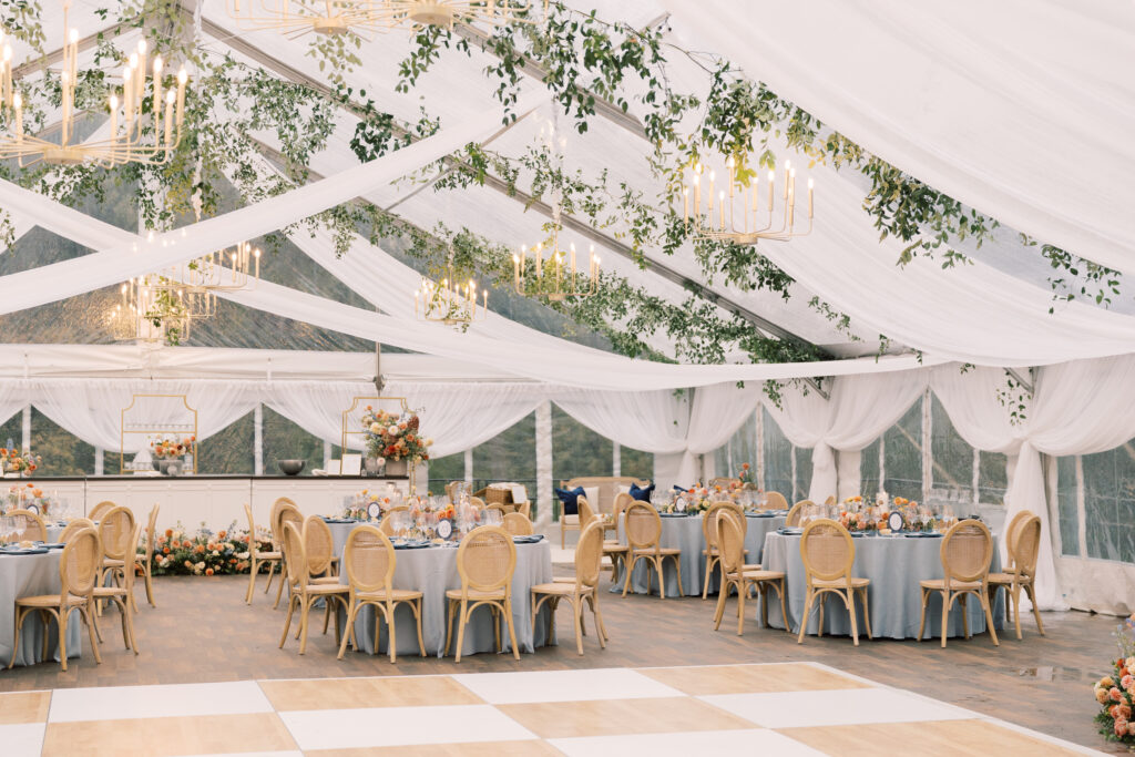 clear top wedding tent with ceiling draping, birch/white check dance floor