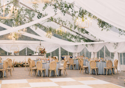 clear top wedding tent with ceiling draping, birch/white check dance floor