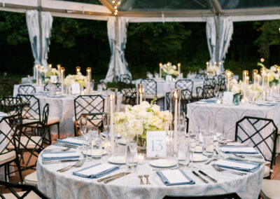 dusty blue and white wedding under clear top tent at Winterthur Museum