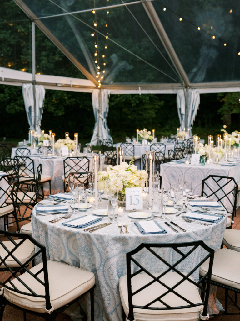 dusty blue and white wedding under clear top tent at Winterthur Museum