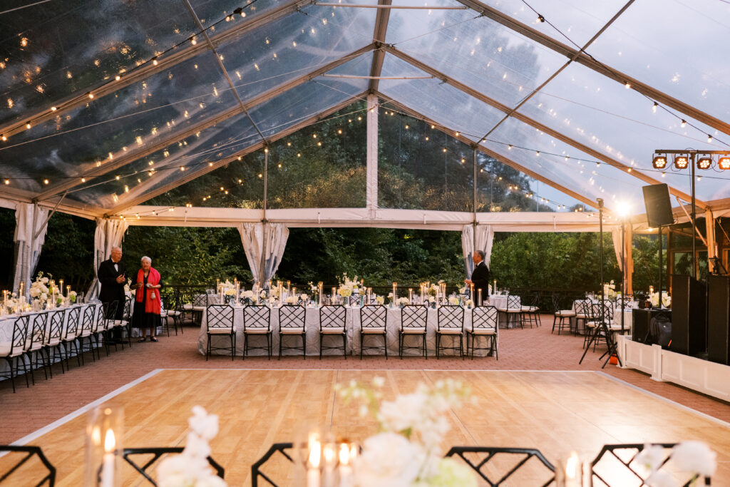 dusty blue and white wedding under clear top tent at Winterthur Museum